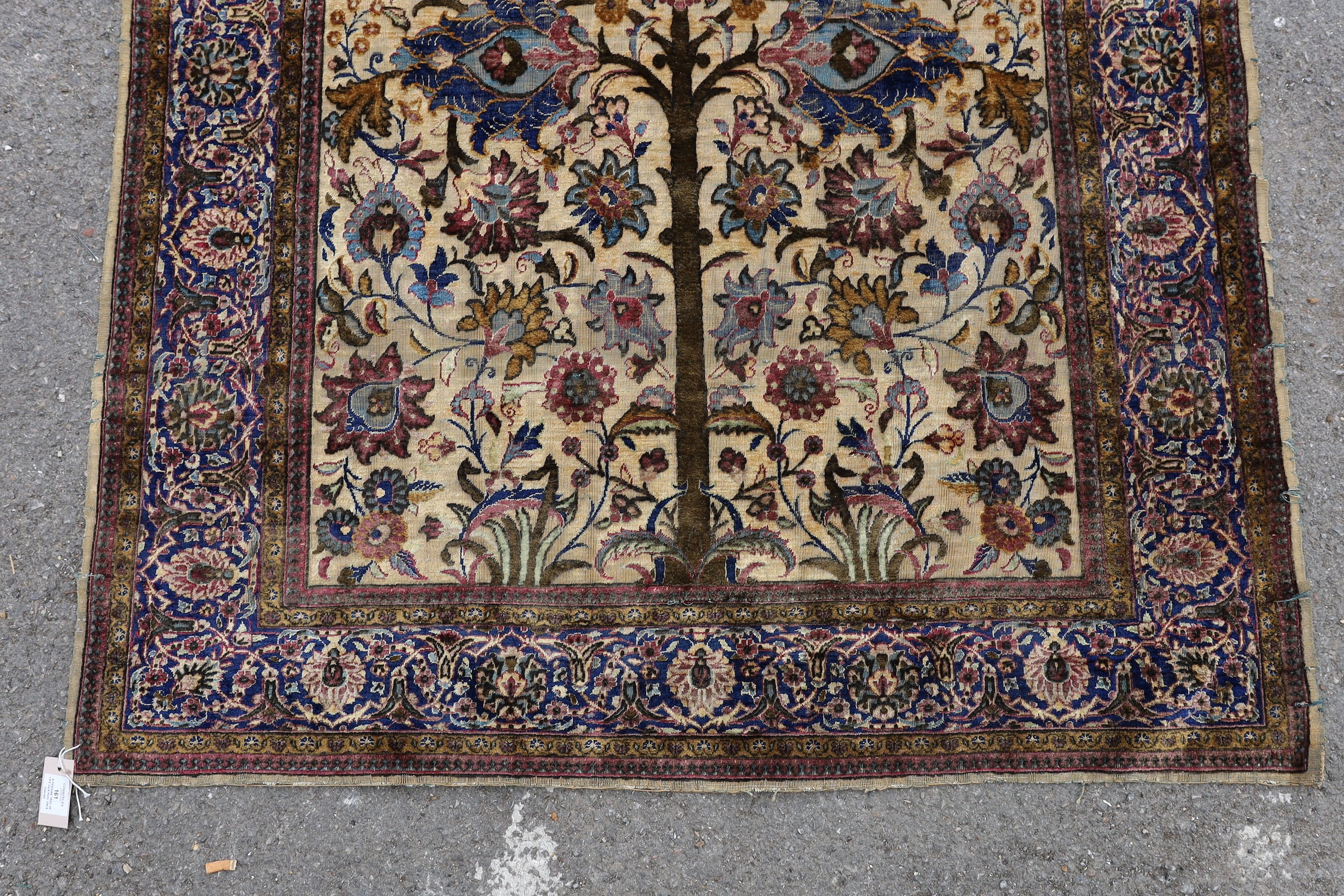 A Persian tree of life silk rug, 206 x 128cm